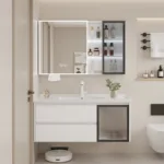 Contemporary bathroom vanity with illuminated mirror cabinet and sink, stylish shelving, and minimalist decor.