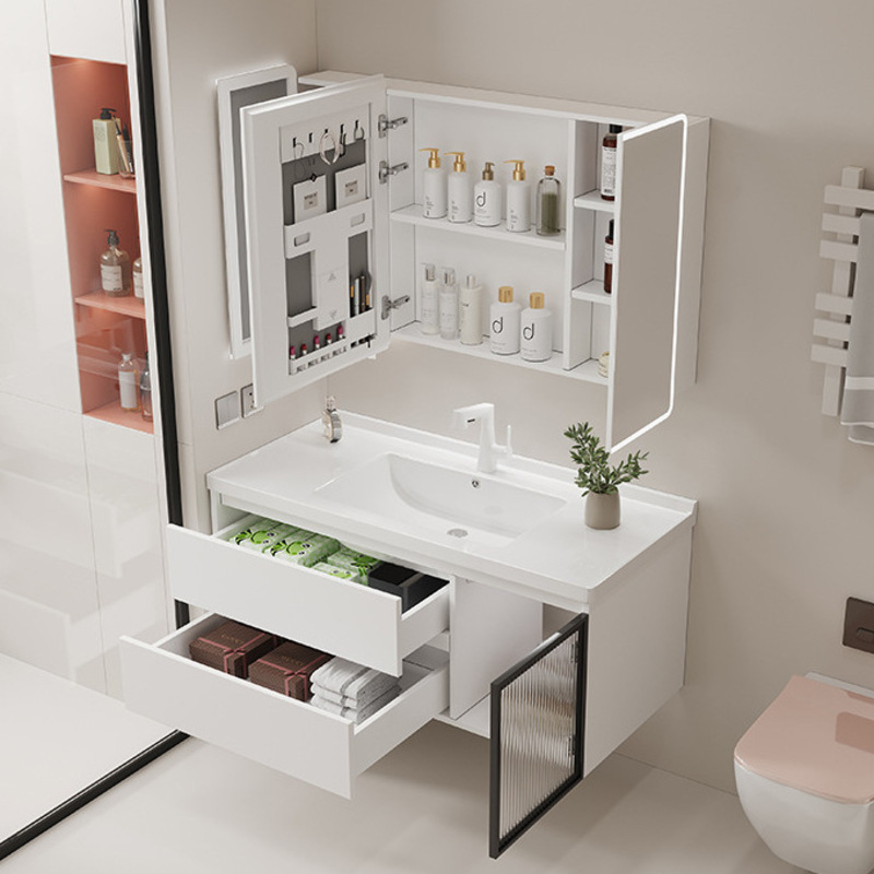 Contemporary bathroom vanity featuring open drawers and mirror cabinet with toiletries. Clean design provides practical storage.