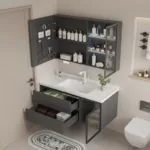 Modern bathroom vanity featuring open drawers, shelves with toiletries, and a sleek design with storage solutions.