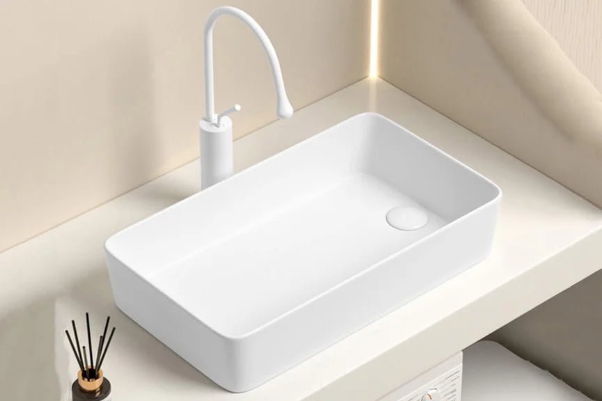 White ceramic countertop basin for bathroom vanity